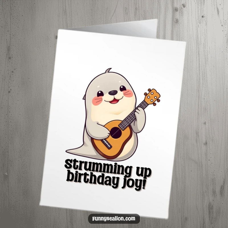 Funny Free Printable Birthday Card: Playful sea lion strumming a ukulele with a huge, happy smile, radiating joy.